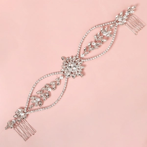 Luxurious silver rhinestone hair comb with elegant vine design for bridal hairstyles