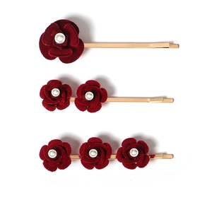 Three burgundy velvet rose hair clips with pearls and gold finish for women styling