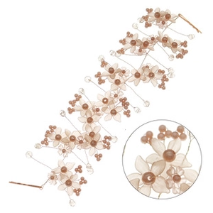 Detail of bridal hair vine featuring matte champagne petals and acrylic pearls on wire