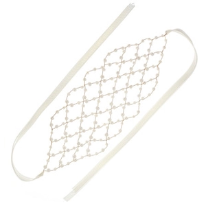 Detail of white acrylic pearl mesh bridal headband with silk ribbons on plain background