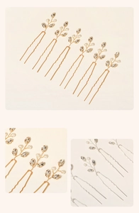 Detailansicht der handgefertigten Braut-Haarnadeln mit Perlen und Strass in Gold und Silber
