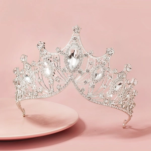 Macro shot of sparkling rhinestones and silver alloy base on a Baroque bridal crown