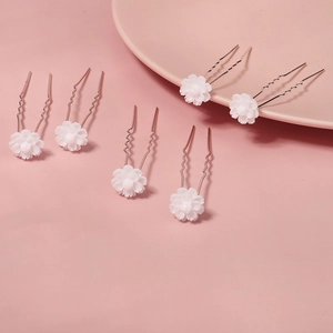 Set of 6 delicate white flower bridal hair pins with silver wavy U-shaped metal fork