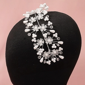 Bridal wedding hair vine with white pearls and acrylic petals on a silver wire