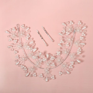 Silver bridal hairband set with handmade pearls and floral crystals for wedding hair styling