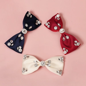 Elegant satin bow hair clips with rhinestones in navy blue, burgundy, and off-white colors