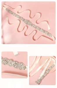 Detailed view of luxury bridal sash with silver rhinestones and white satin ribbon