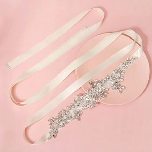 Elegant bridal sash belt with floral crystal rhinestones on ivory satin ribbon for wedding dress