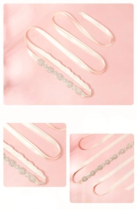Détail macro de ceinture de mariée avec ruban ivoire, strass marquise et perles