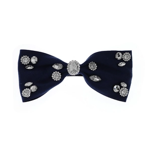 Elegant deep blue velvet bow hair clip with crystal emerald centerpiece and rhinestones