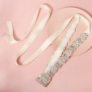 Elegant bridal sash with luxury rhinestones and white pearls on cream satin ribbon