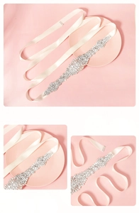 Détails rapprochés de la ceinture de mariée avec fleurs en cristal cousues à la main