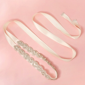 Exquisite bridal sash with silver rhinestone wave pattern on ivory satin ribbon
