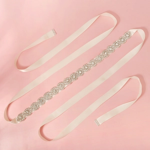 Elegant bridal wedding dress sash with sparkling rhinestones on off-white satin ribbon