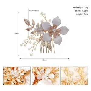 Elegant pearl bridal hair comb with crystal flowers and golden leaves for weddings