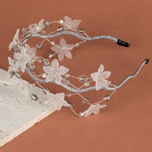 Elegant silver wire floral headband with acrylic flowers and crystals on stone base