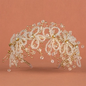 Exquisite gold beaded crystal bridal headband with intricate floral vine design for weddings