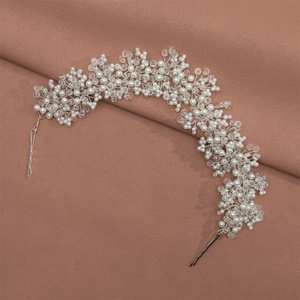 Elegant bridal hair vine with handmade white pearls and crystal beads on a pink velvet base