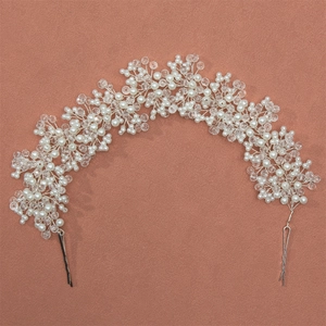 Handmade bridal headband with white faux pearls and crystal beads on a metal wire