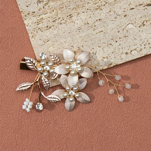 Exquisite gold floral hair clip with delicate pearls and rhinestones in oriental style