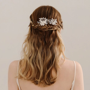 Elegant silver bridal hair pins with white matte flowers and pearls for wedding hairstyles