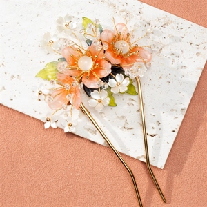 Ancient style peach blossom hair pins with orange resin petals and golden metal stems
