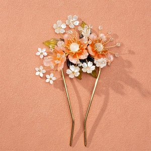 Traditional peach blossom hair pin with resin petals and golden double-prong base