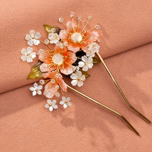 Classic Chinese peach blossom hair pin with resin petals and golden metal stems