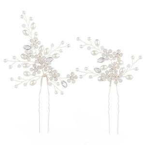 Handmade bridal hair pins set with white pearls and crystals on silver wire