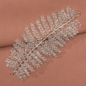 Exquisite bridal headband with silver wire and hand-beaded sparkling crystals for weddings