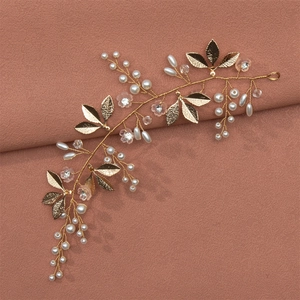 Handmade gold bridal headband with pearls, pink resin flowers and delicate metal leaves