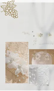 Detailed close-up of white chiffon flower bridal hair comb set with pearls and rhinestones