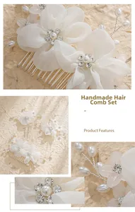 Detail of handmade bridal hair comb set with white fabric flowers and pearls