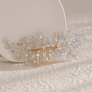Elegant gold bridal hair comb with blue rhinestones and crystals for weddings