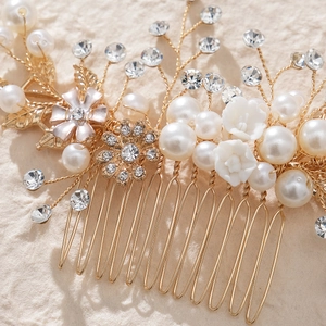 Elegant bridal hair comb with white flowers pearls and crystals in gold wire finish