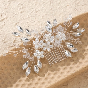 Elegant bridal hair comb with handmade pearl flowers and crystals on a silver metal base