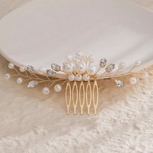 Handmade bridal hair comb with pearls and rhinestones on elegant gold-tone prongs