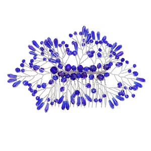 Elegant bridal hair comb with deep blue crystals and silver wire flower design