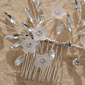 Silver bridal hair comb with acrylic flowers and sparkling rhinestones for wedding styling