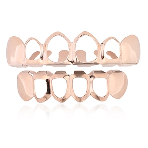 Détail de l'ensemble de grillz hip-hop ajourés en or rose pour dents du haut et du bas