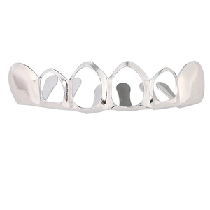 Grillz dentaire en métal argenté poli avec finition brillante et design ajouré