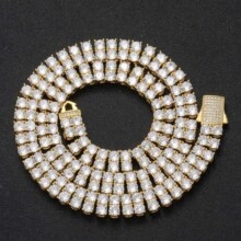 Close-up of triple row gold tennis chain featuring white circular zircon stones