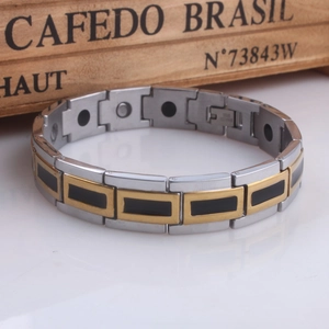 Mens silver stainless steel magnetic therapy bracelet with black drip oil and gold accents