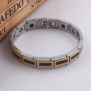 Two-tone gold and silver stainless steel magnetic therapy bracelet with black drip oil inlay