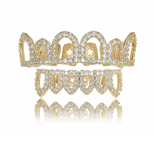 Set de grillz hip-hop dorés avec découpe en étoile et pierres de zircone micro