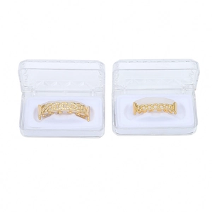 Iced out gouden Cuban link grillz set met micro pave zirkoon in doorzichtige doos