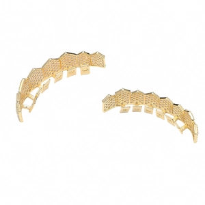 Detailed macro view of 18k gold plated hip hop grillz set with micro zircon stones
