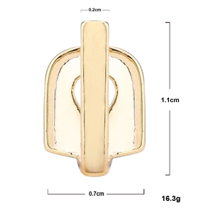 Detail showing 1.1cm height and 0.7cm width dimensions of gold hip hop single tooth grillz