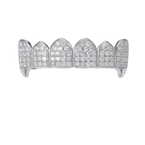 Silver iced out six-tooth grillz with fangs and micro-pave cubic zirconia stones