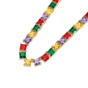 Hiphop necklace with square multi-color zircons and golden base on white background